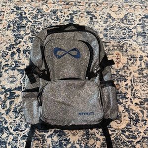 Nfinity sparkle silver cheer backpack w navy logo!!!! Great condition!